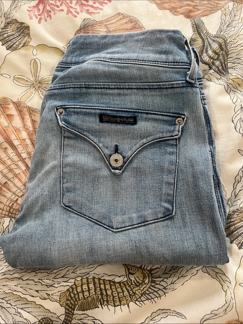 Light Blue Women’s Jeans with Pocket Button Detail
